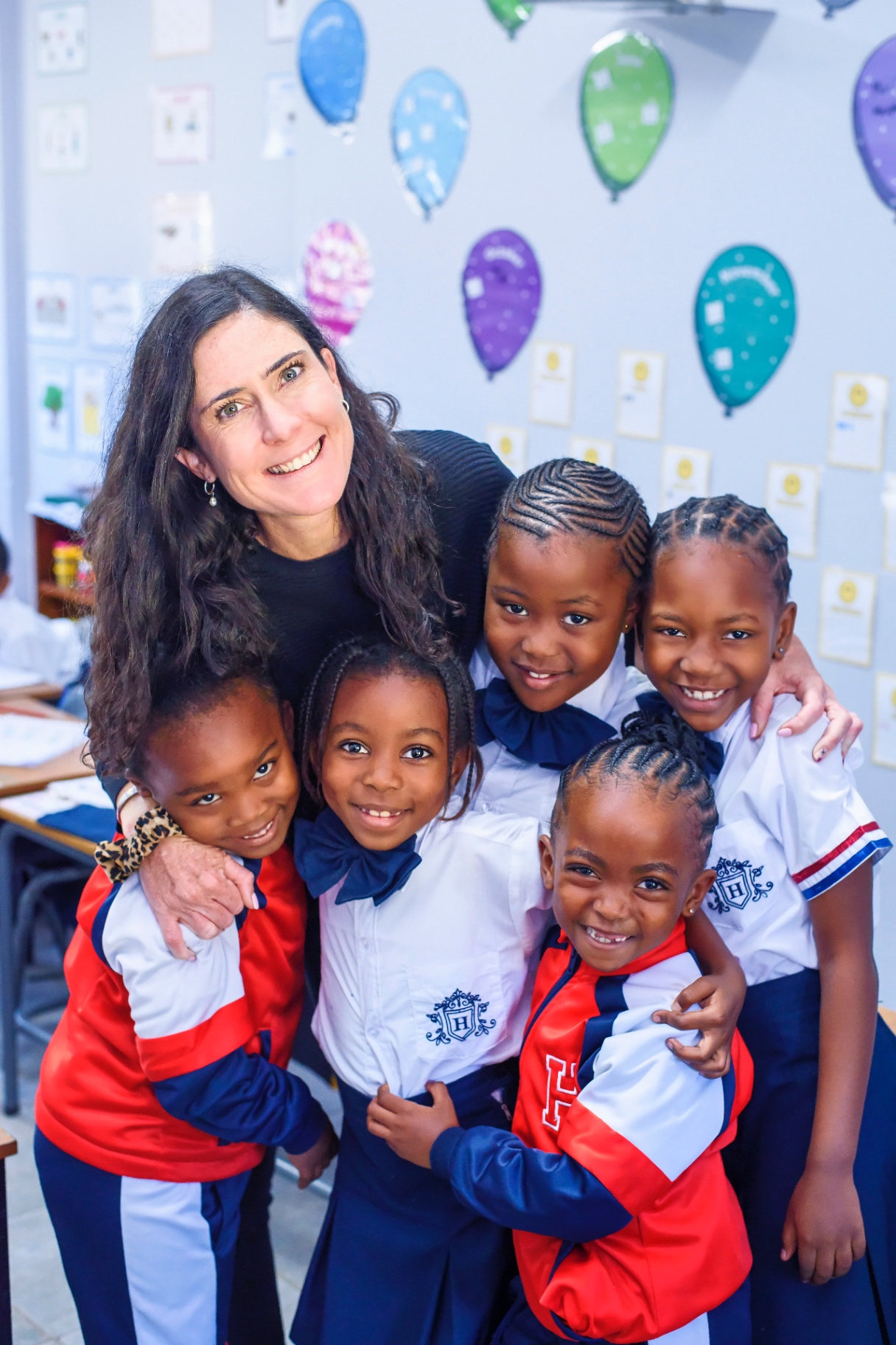 A Harper House teacher with her pupils